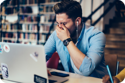 man looking unhappy at laptop