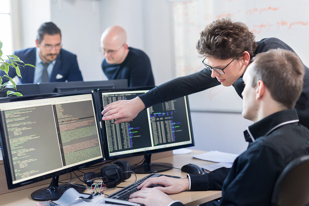digital team examining code